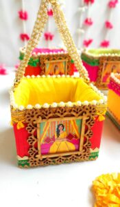 A beautifully crafted Haldi Favour Basket adorned with traditional motifs and vibrant colors.