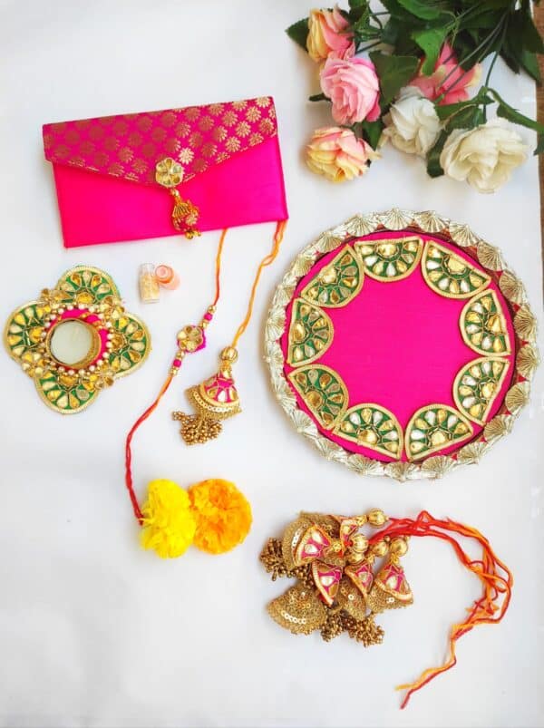 Elegant Rakhi for brother with intricate design and charming Rakhi for sister-in-law with delicate pattern.