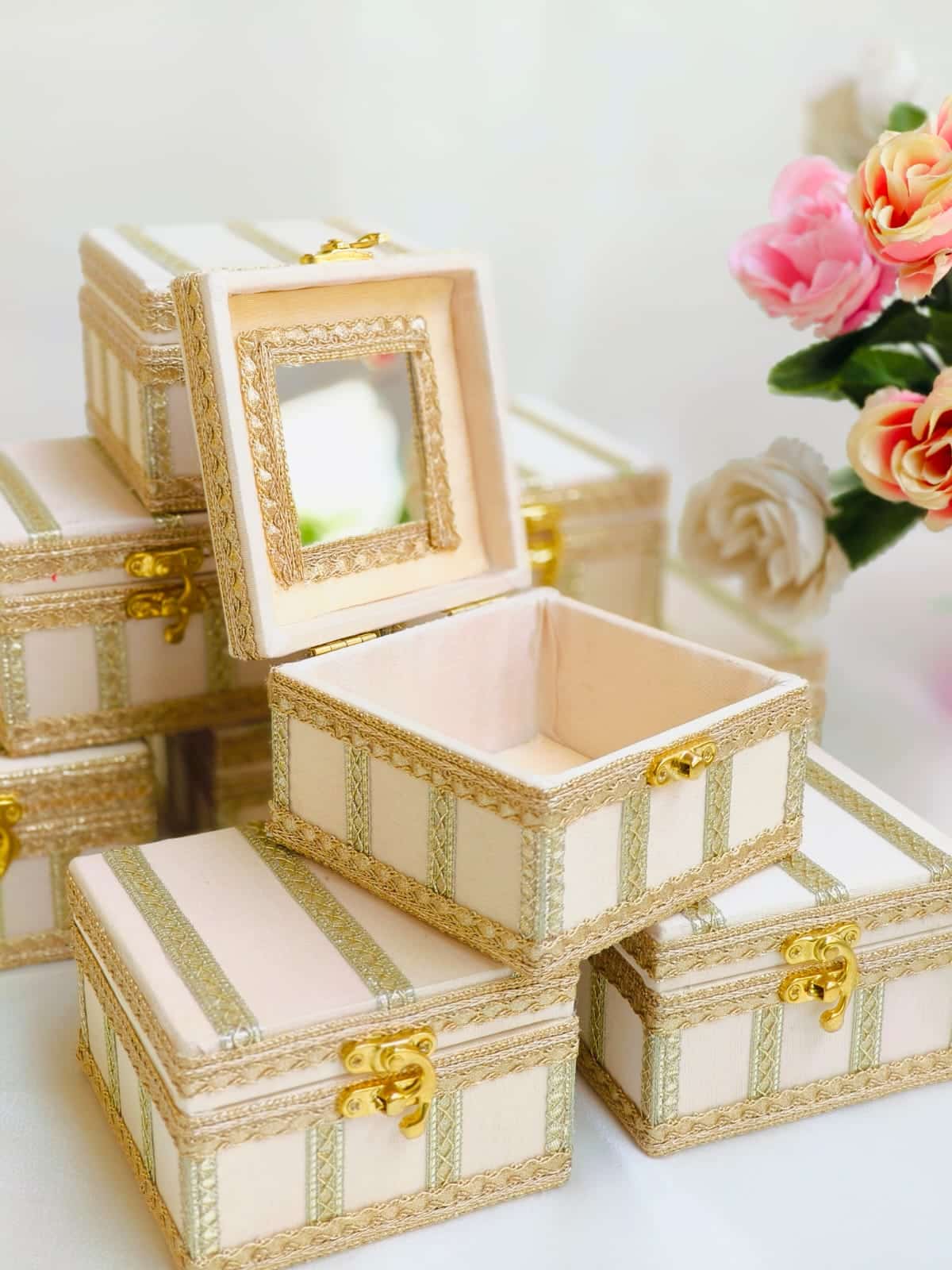 A meticulously handcrafted 4x4x5 inch hamper box with an elegant design, ideal for gifting jewelry and small keepsakes. The box is adorned with intricate details, showcasing superior craftsmanship and a luxurious finish.