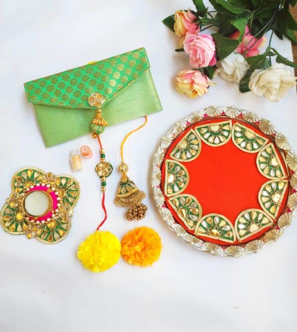 Elegant Rakhi for brother with intricate design and charming Rakhi for sister-in-law with delicate pattern.