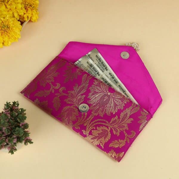 Traditional Indian shagun envelopes featuring intricate embroidery and modern design elements