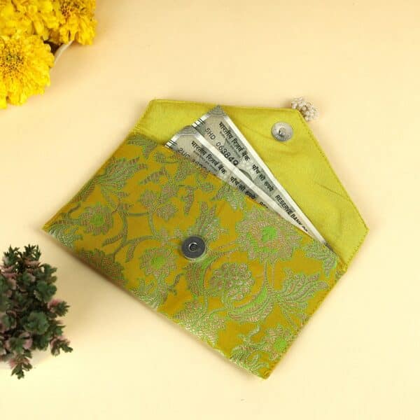 Traditional Indian shagun envelopes featuring intricate embroidery and modern design elements